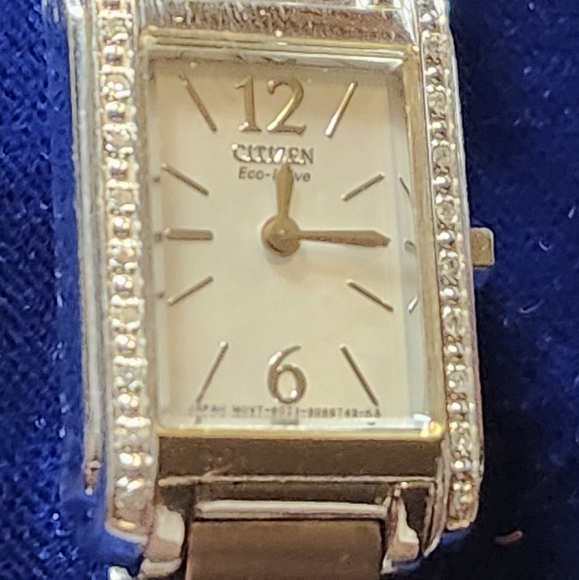 Vintage Y2K Womens Citizen Eco-Drive Tank Watch with simulated diamond bezel